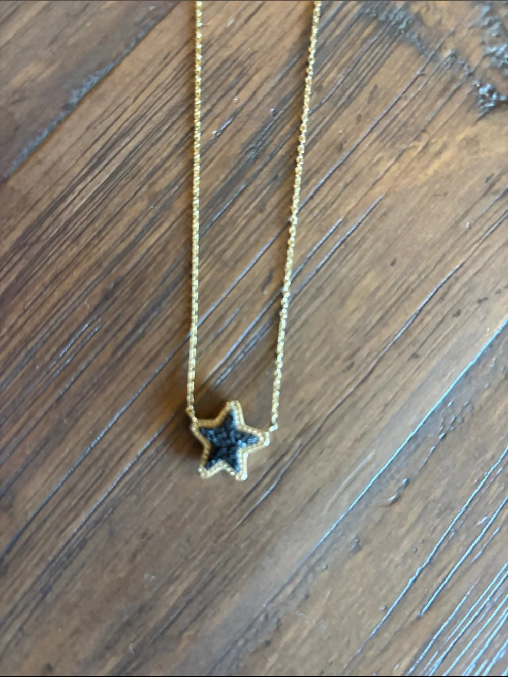 Kendra Scott Gold Star Necklace with Black Center